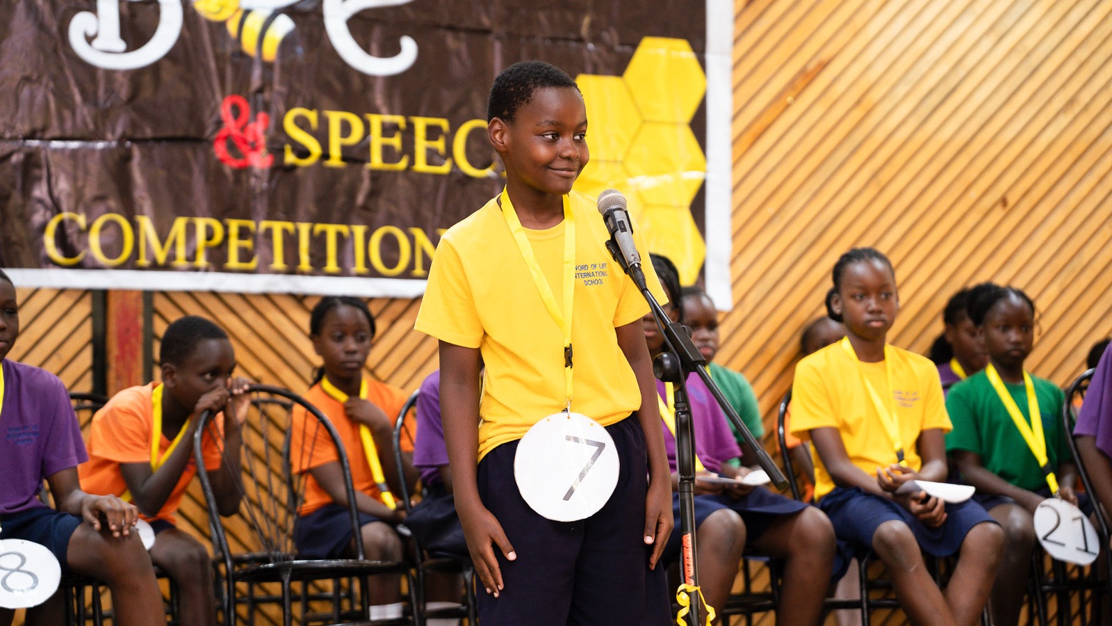 Middle school learner competing in the WOLIS Spelling Bee